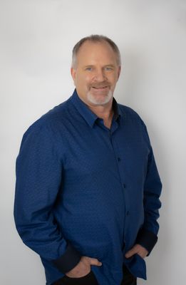Portrait of Corey Christenson, Associate, SRES®.